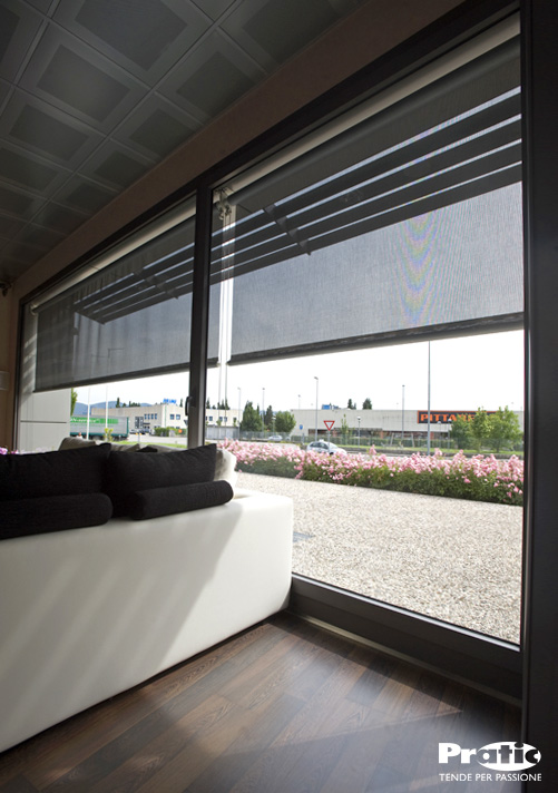 translucent fabric blinds shading a room from the sun